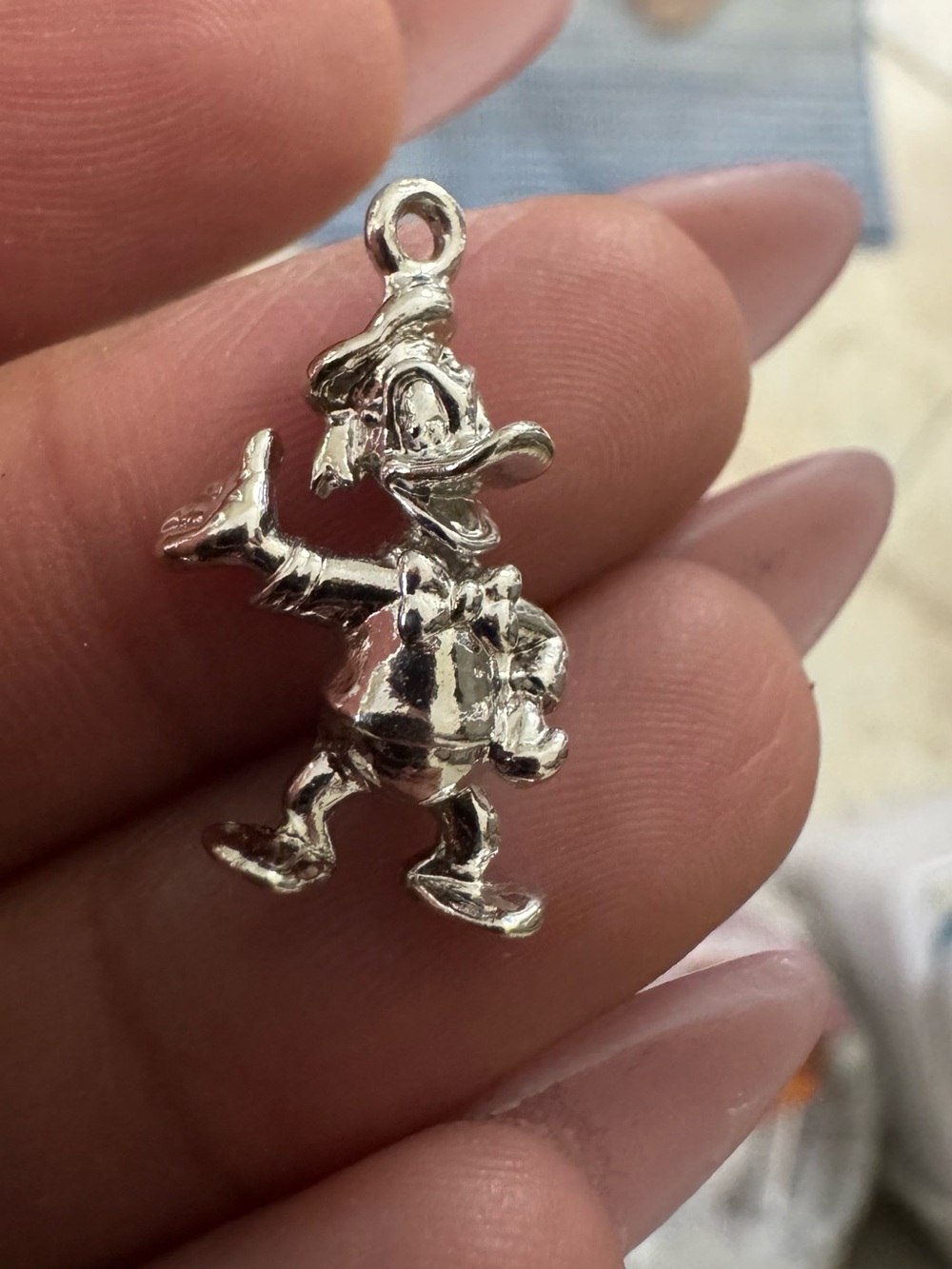 3 VINTAGE WALT DISNEY STERLING SILVER CHARMS - Donald Duck, Goofy, and Pluto.
